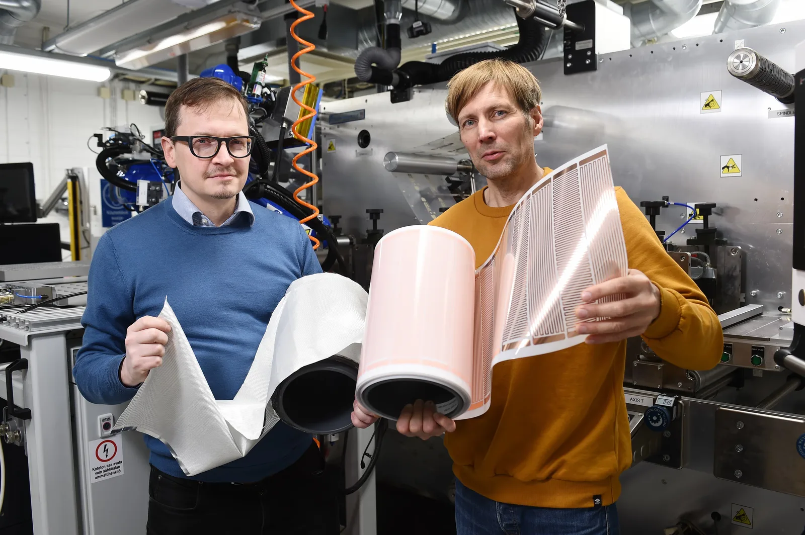 A picture of TWSC team with their Halia technology in their hands